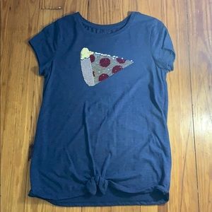 Blue shirt. Glitter pizza can change colors.